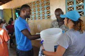 Emily taught the Son how to  properly assemble his bucket.  He brought his Father back to learn.